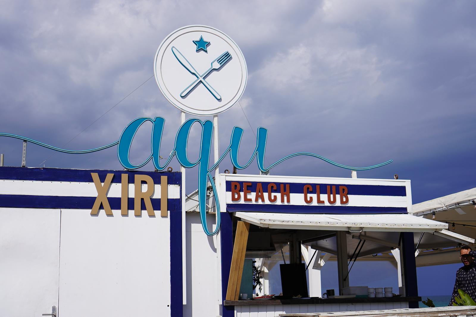 Beachside seating and cocktails at Aqu Xiri Beach Club on Badalona's promenade