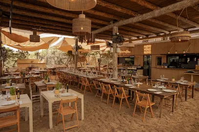 Beachfront dining and sunset at Beso Beach Formentera